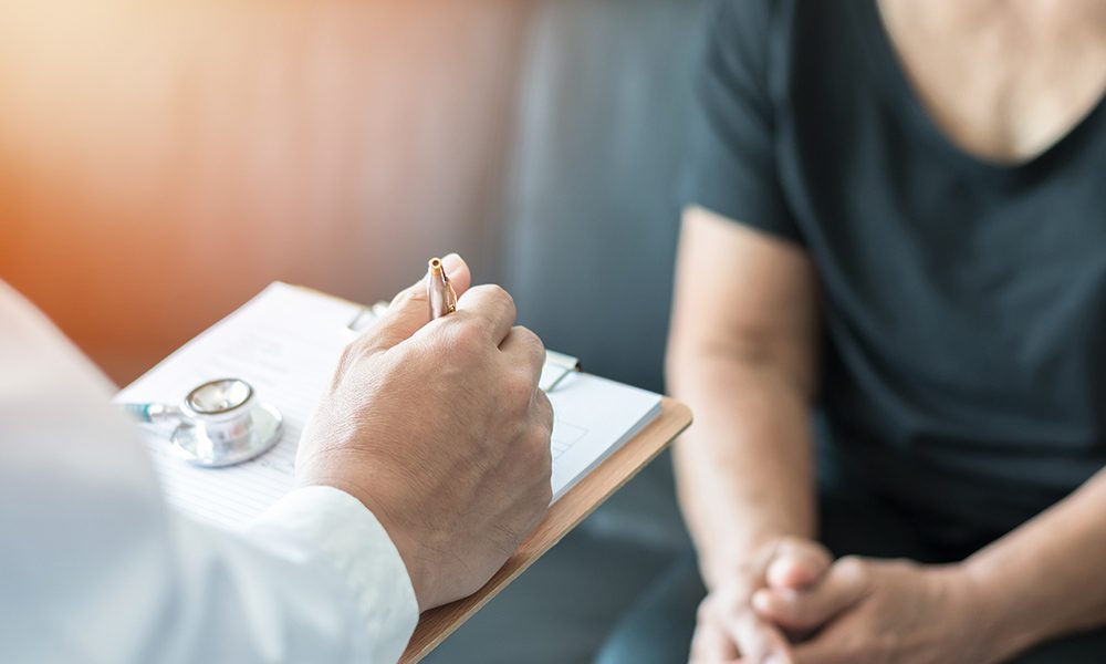 Blog - Doctor Talking with Patient About a Diagnosis in the Office