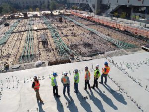 Construction workers surveying a jobsite