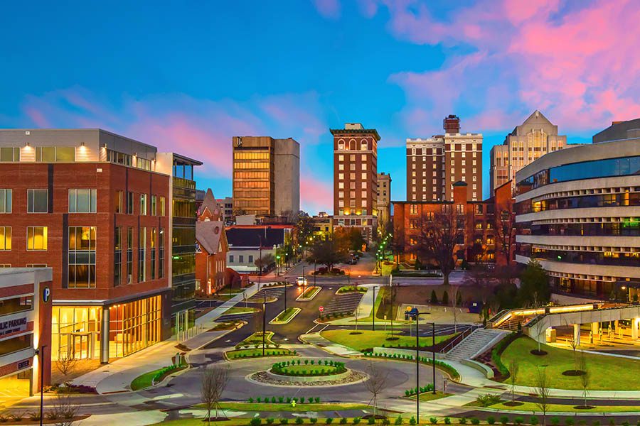 Greenville, SC Insurance - Downtown Greenville, South Carolina With Beautiful Lights at Sunset on a Gorgeous Day