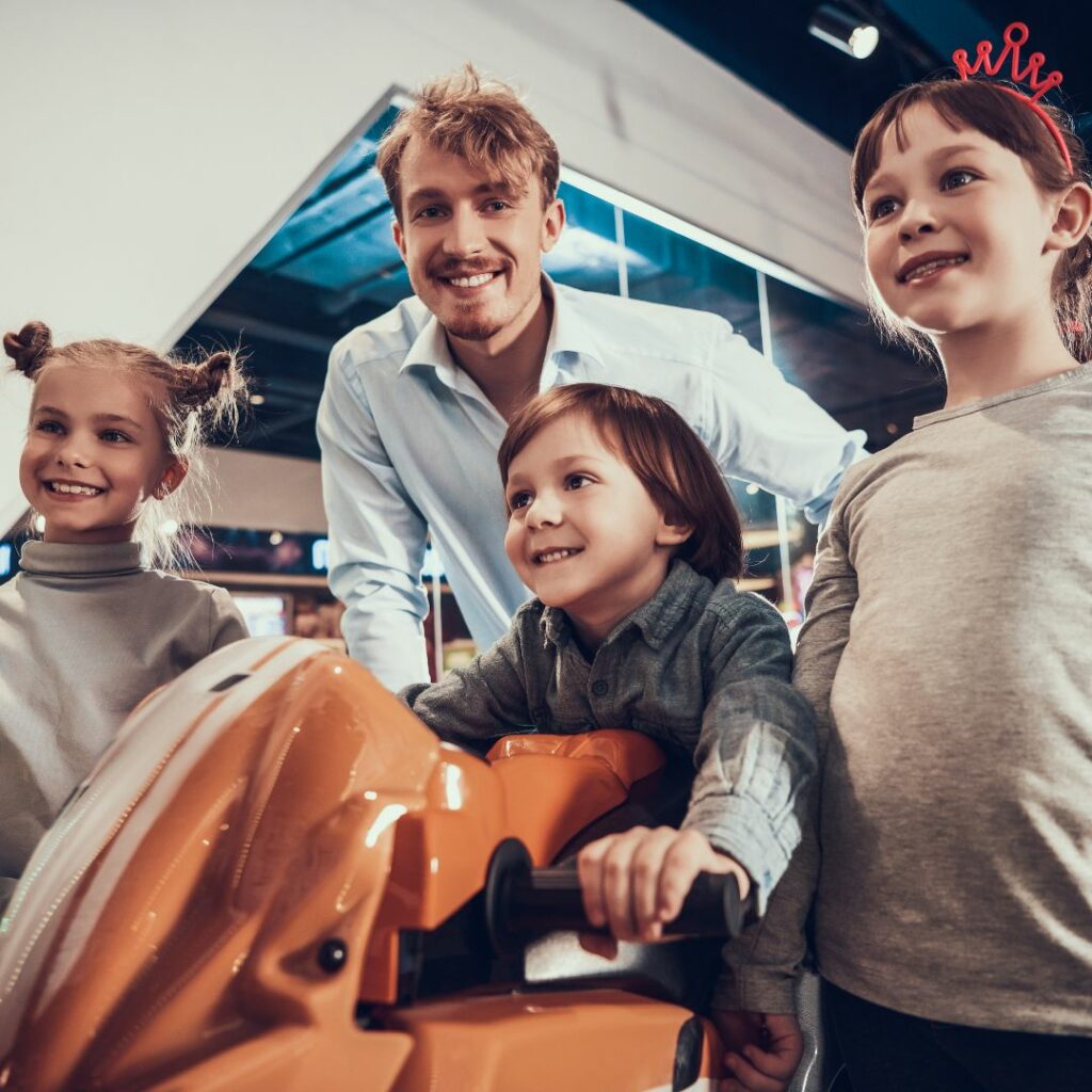 Family playing arcade game